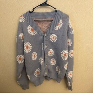 Cute sky blue cardigan with flower details. Men’s XL, fits like L.